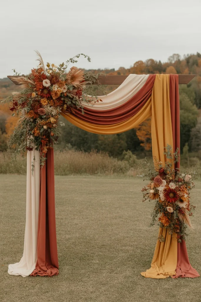 12 Magical Wedding Arch Designs to Elevate Your Fall Celebration 8 Draped Fabric Wedding Arch