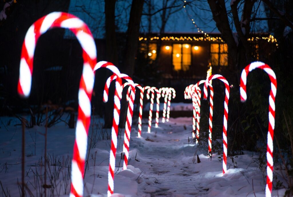 17 Magical Christmas Outdoor Decor Ideas to Transform Your Home This Holiday Season 10 Candy Cane Path Markers